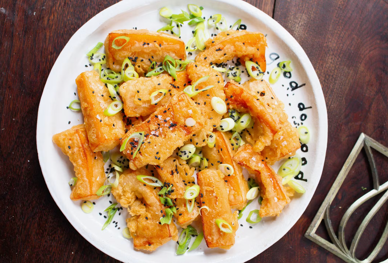 crookneck squash beignets on a plate